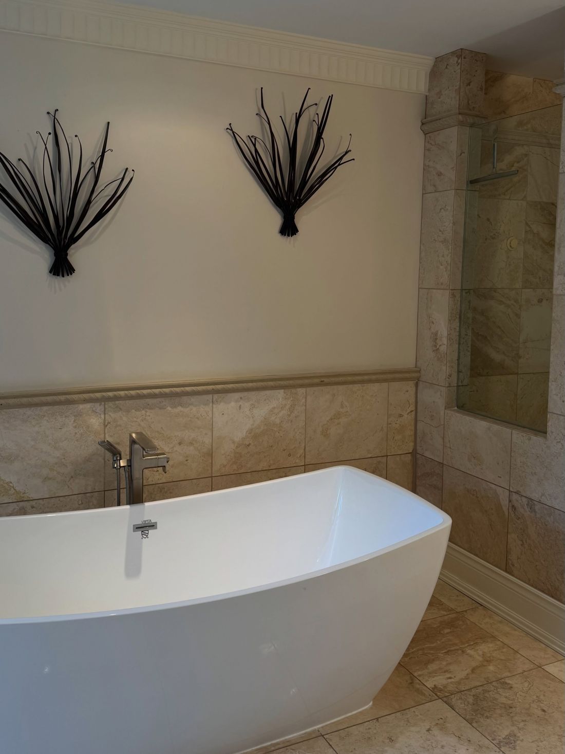 Freshly cleaned bathroom with freestanding bathtub